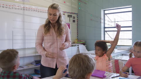 Teacher Engaging Students with Interactive Data in Classroom