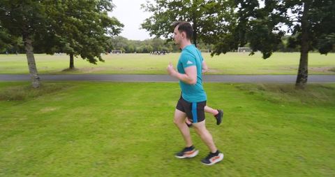 Men Jogging in Park Embracing Fitness and Outdoors - Download Free Stock Images Pikwizard.com