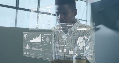 Tech Professional Analyzing Data on Futuristic Interface - Download Free Stock Images Pikwizard.com