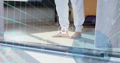 Bare feet on sunlit threshold with smart wearable overlay and sliding glass door wellness