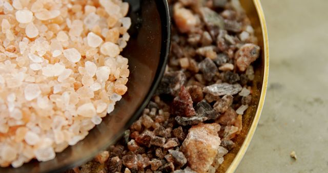 Close-Up of Pink Himalayan Salt and Black Lava Sea Salt - Download Free Stock Images Pikwizard.com