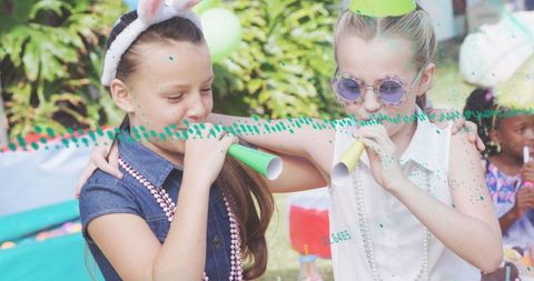 Diverse Children With Party Accessories Enjoying Outdoors