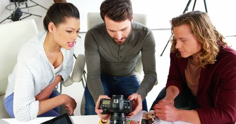 Young Creative Team Analyzing Digital Photography Tools - Download Free Stock Images Pikwizard.com