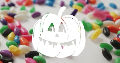 Halloween Jack-o'-Lantern with Colorful Jelly Beans in Background