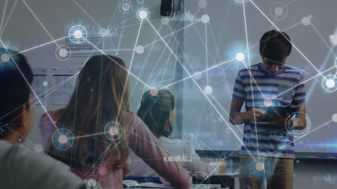 Teacher Utilizing Digital Interfaces in Connected Classroom Environment