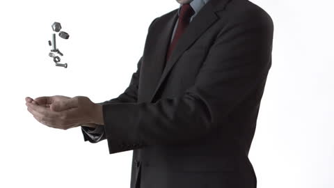 Businessman Playing with Nuts and Bolts in Slow Motion