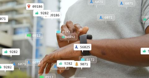 Man Engaging with Social Media Apps on Smartwatch Outdoors - Download Free Stock Images Pikwizard.com