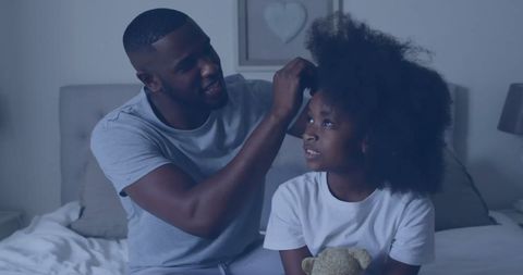 Father Braiding Daughter's Hair, Bonding Moment on Bed