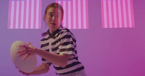 Athlete with Rugby Ball in Dynamic Neon Lighting