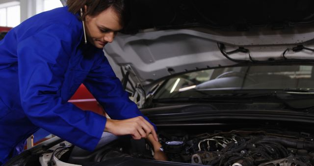 Female Mechanic Young Professional Working on Car Engine - Download Free Stock Images Pikwizard.com