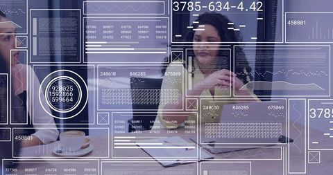 Curly-haired woman listening during data-driven meeting with dashboard overlays