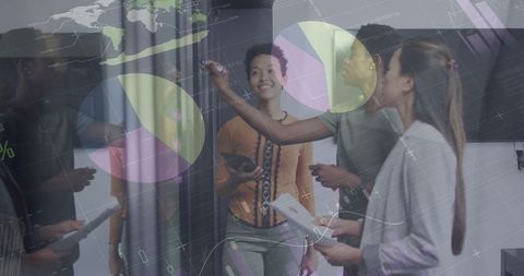 Creative Business Team Analyzing Data with Digital Graphs