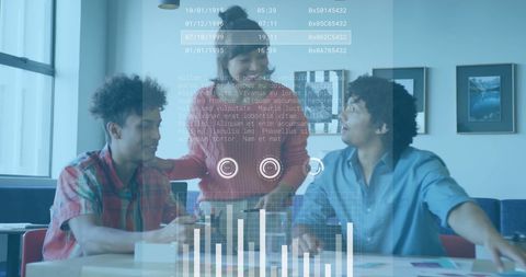 Creative Team Collaborating with Data Interface at Modern Meeting