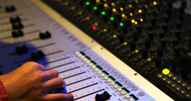 Sound Engineer Adjusting Mixing Board in Recording Studio - Download Free Stock Images Pikwizard.com