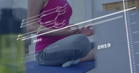 Woman practicing guided meditation using smartphone with ar fitness overlay at home