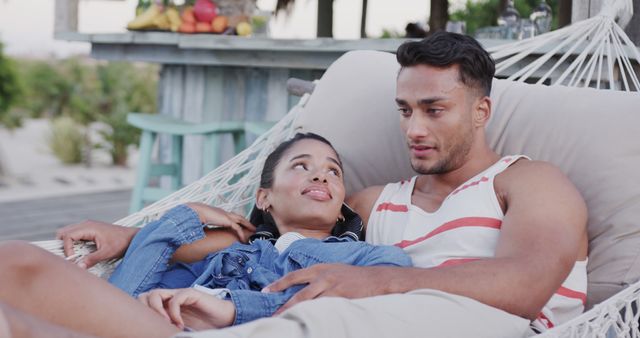 Young Couple Relaxing on Hammock at Tropical Resort - Download Free Stock Images Pikwizard.com