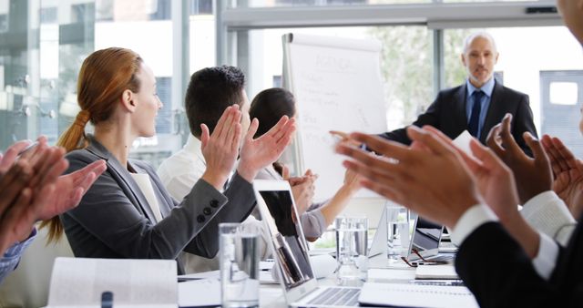 Business people applauding during a meeting in the office 4k - Download Free Stock Photos Pikwizard.com