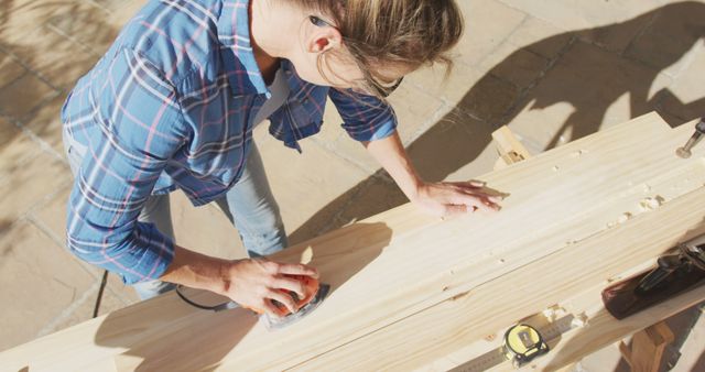 Female Carpenter Smoothing Wooden Plank Outdoor Workshop - Download Free Stock Images Pikwizard.com