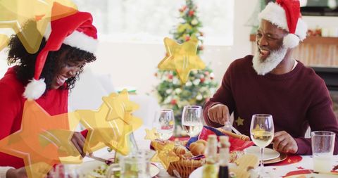 Family Enjoying Christmas Dinner with Joy and Laughter