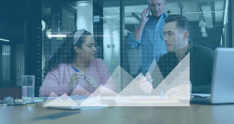 Diverse Team Discusses Business Data Analysis in Modern Office