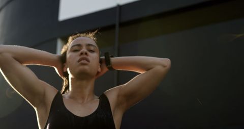 Determined Young Woman in City, Preparing for Workout - Download Free Stock Images Pikwizard.com