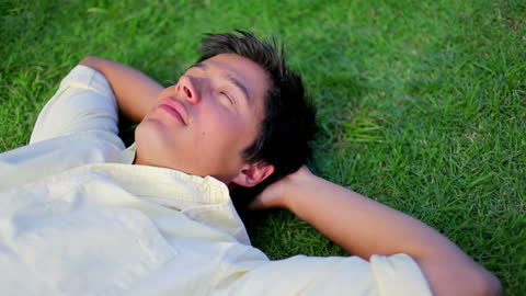 Man Relaxing in Tranquil Countryside Environment