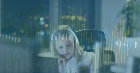 Businesswoman Deep in Work Surrounded by Digital Graphs