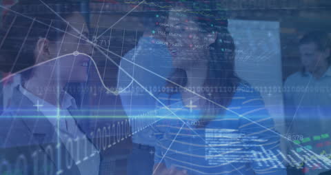 Businesswomen Analyzing Data in Futuristic Corporate Environment