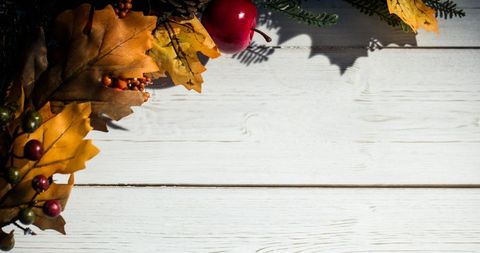 Festive Christmas Decorations with Leaves and Wood Background - Download Free Stock Images Pikwizard.com