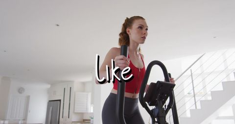 Woman Exercising on Indoor Elliptical Fitness Equipment