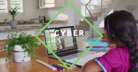 Child engaged in online learning at home on cyber monday