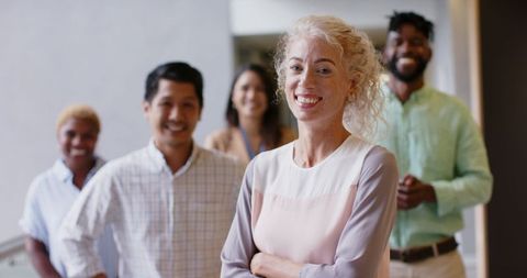 Successful Businesswoman Leading Diverse Team with Confidence