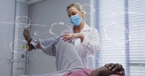 Healthcare Professional Conducting Physiotherapy Session with Floating Medical Formulas