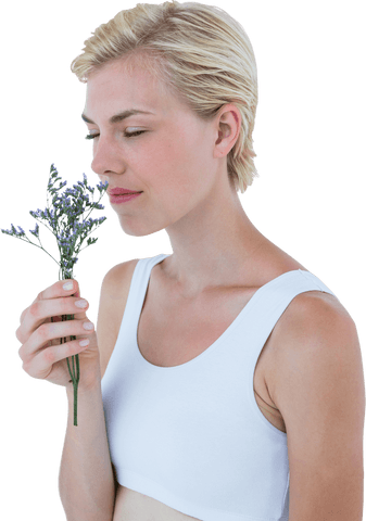 Woman smelling purple flower in calm setting, close-up transparent background