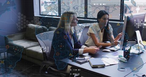 Data Analysts Collaborating in Modern Office with Digital World Map