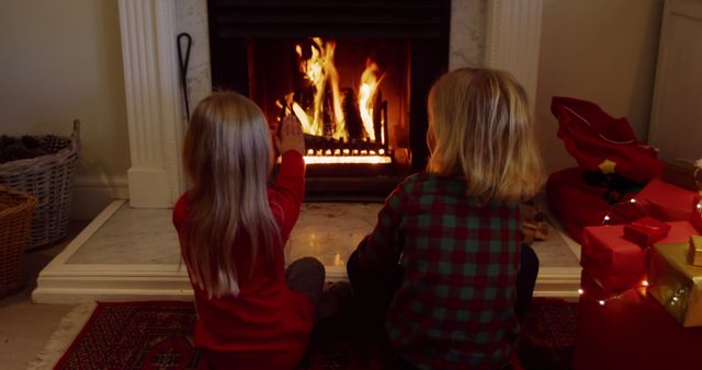 Children Warming Hands by Fireplace on Christmas Eve - Download Free Stock Images Pikwizard.com