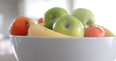 Assorted Fresh Fruits in White Ceramic Bowl on Kitchen Counter