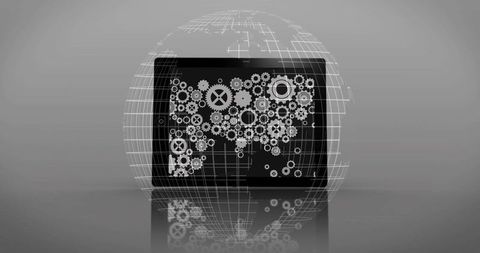 Digital tablet displaying gears in global wireframe sphere