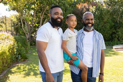 Three-Generation African American Family Smiling Outdoors