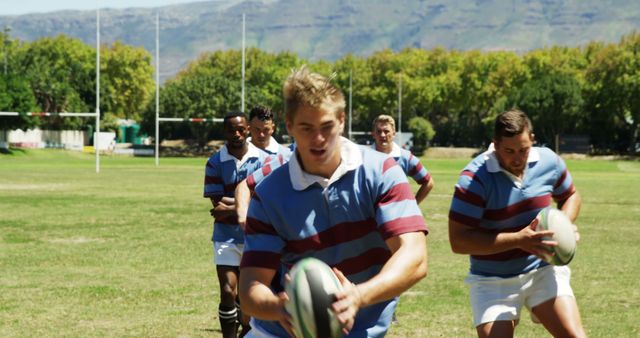 Rugby Players Practicing Passes Outdoors on Sunny Day - Download Free Stock Images Pikwizard.com