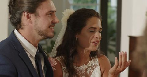 Bride in Lace Dress and Groom Celebrating Wedding