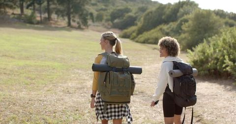 Adventurous Backpacking Women Exploring Nature Trails
