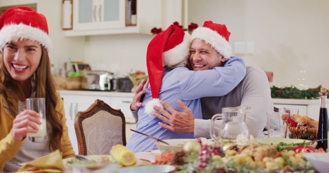 Family Celebrating Christmas Together in Cozy Kitchen - Download Free Stock Images Pikwizard.com