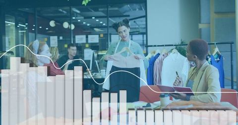 Fashion Team Analyzing Market Trends in Modern Office Lounge