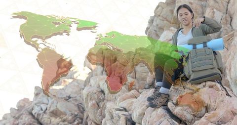 Woman Hiker Preparing Backpack on Rocky Cliff with World Map Overlay