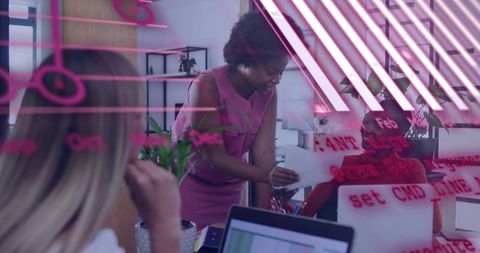 Woman Leading Team Collaboration Around Laptop with Red Glass Brainstorm Overlay