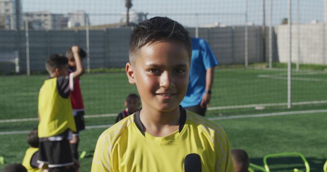 Young Boy on Soccer Field During Training Session on Sunny Day - Download Free Stock Images Pikwizard.com