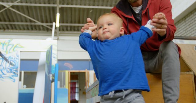 Father Helping Baby Learning to Walk Indoors - Download Free Stock Images Pikwizard.com