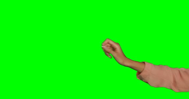 Image features a person holding an invisible object against a green screen background. Suitable for creating custom graphics, educational videos, and virtual presentations. Ideal for projects requiring an isolated hand gesture on a customizable background.