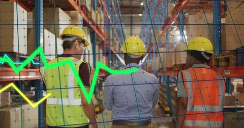Warehouse workers analyzing warehouse stock with overlaid data